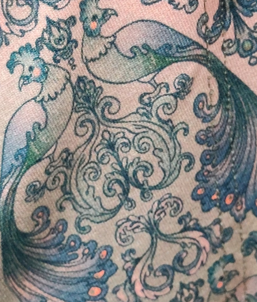 Mint plus size kjole i A-form med påfugle. Tulla Mint Baroque