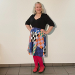 Kobe Checkered Mix - A-formet plus size nederdel med mønster i forskellige tern.